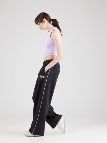 NIKE - Top deportivo 'ONE' en lila