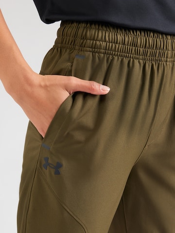 UNDER ARMOUR Zwężany krój Spodnie sportowe 'Unstoppable' w kolorze zielony
