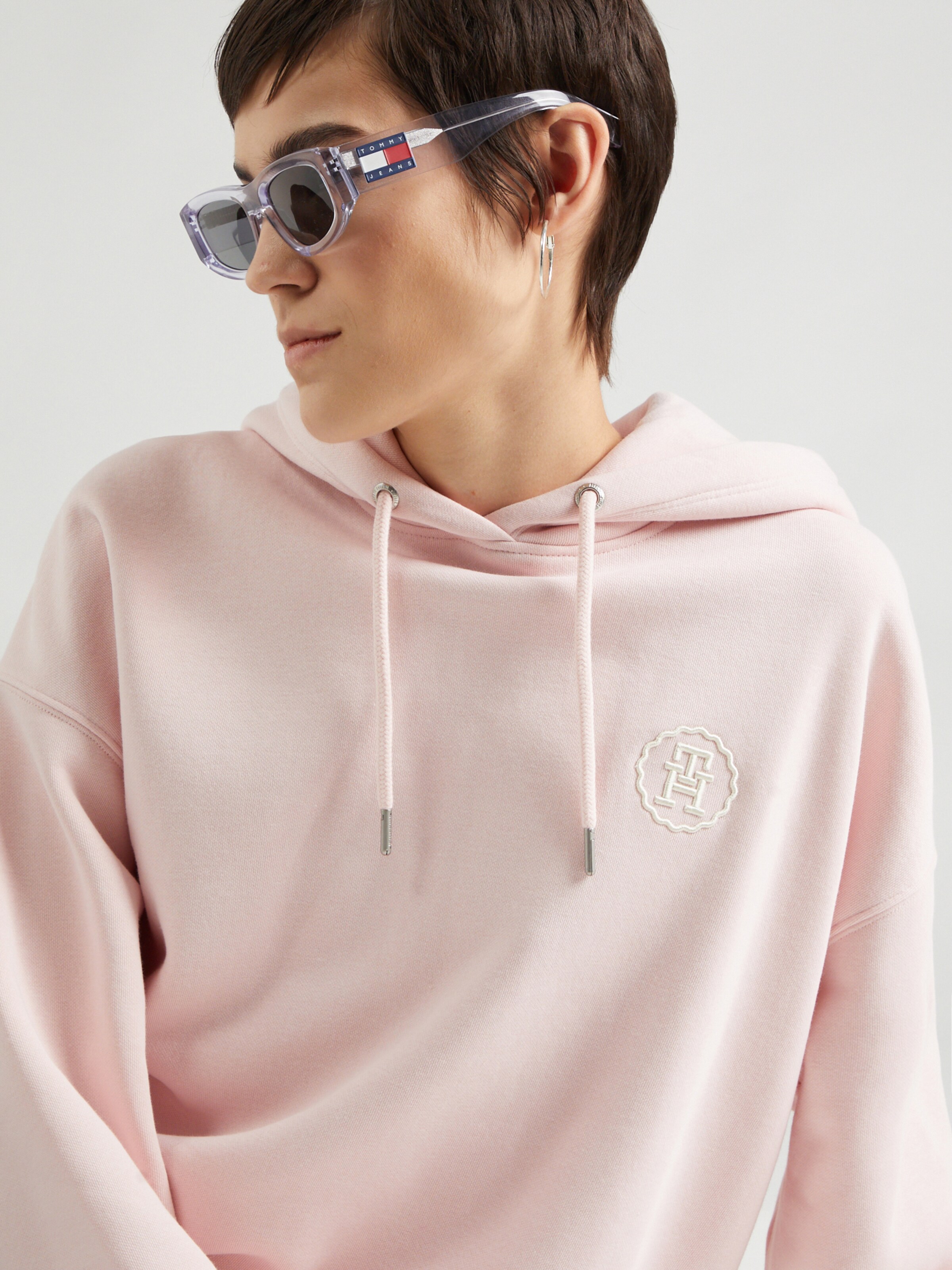 TOMMY HILFIGER Sweatshirt in Pastel Pink ABOUT YOU