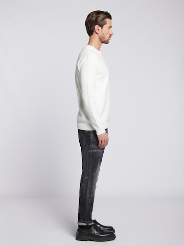 Goldgarn Tapered Jeans i svart