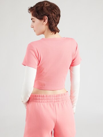 UNDER ARMOUR Koszulka funkcyjna 'Rival' w kolorze różowy