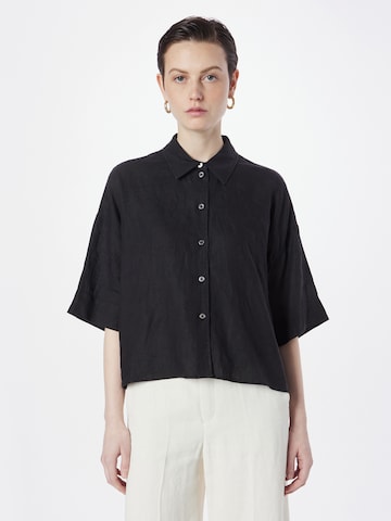 DRYKORN - Blusa 'YARIKA' en negro: frente