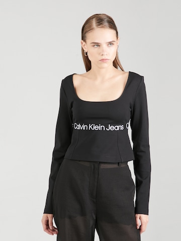 T-shirt Calvin Klein Jeans en noir : devant