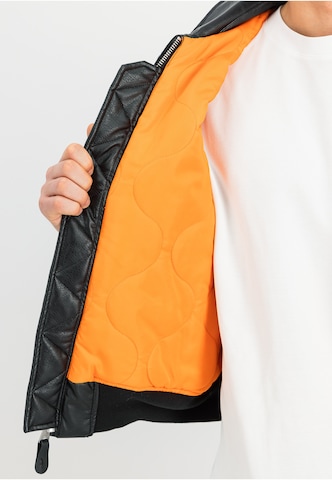ALPHA INDUSTRIES Tussenjas 'Cwu Fl Mod' in Zwart
