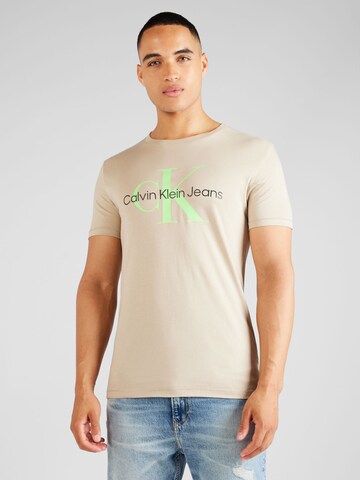 Calvin Klein Jeans T-shirt i beige: framsida