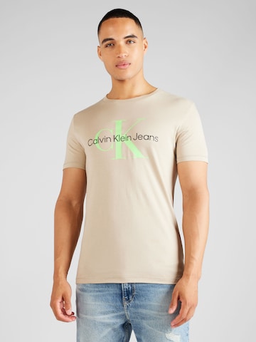Calvin Klein Jeans Koszulka w kolorze beżowy: przód