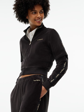 Wide leg Pantaloni de la Tommy Jeans pe negru
