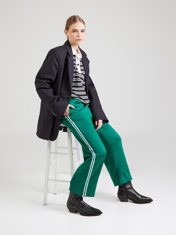 Loosefit Pantaloni di Champion Authentic Athletic Apparel in verde