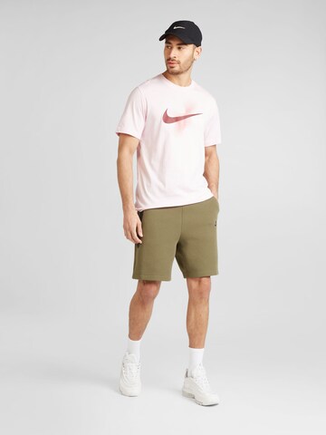 Loosefit Pantaloni 'Tech Fleece' de la Nike Sportswear pe verde