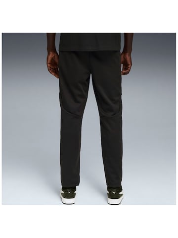 regular Pantaloni sportivi 'Puma Evostripe Warm Pants' di PUMA in nero