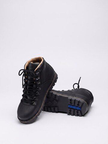 BIRKENSTOCK Veterlaarzen 'Jackson' in Zwart