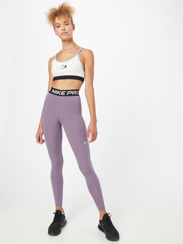 NIKE Skinny Sportsbukse i lilla