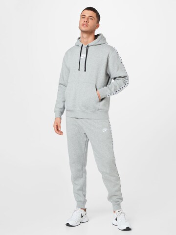 Tuta da jogging di Nike Sportswear in grigio: frontale