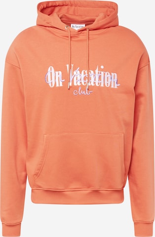On Vacation Club Sweatshirt in Orange: front