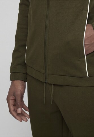 Completo per l'allenamento di Sergio Tacchini in verde: frontale