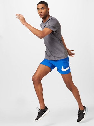 Nike Sportswear - regular Pantalón en azul