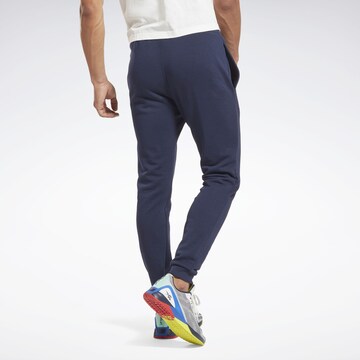 Reebok Ozke Športne hlače | modra barva