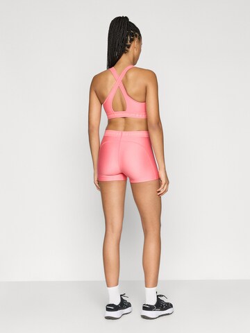 UNDER ARMOUR Skinny Sportbroek in Roze