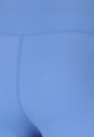 Athlecia Skinny Sportbroek 'Blossom' in Blauw