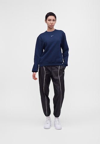 Nike Sportswear Tréning póló 'STDO FLC' - kék