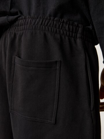 Pull&Bear Wide leg Byxa i svart