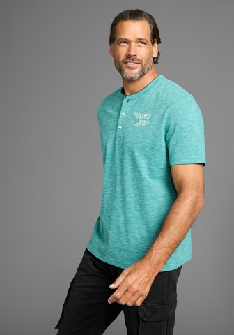 Man's World T-Shirt in Blau: Vorderseite