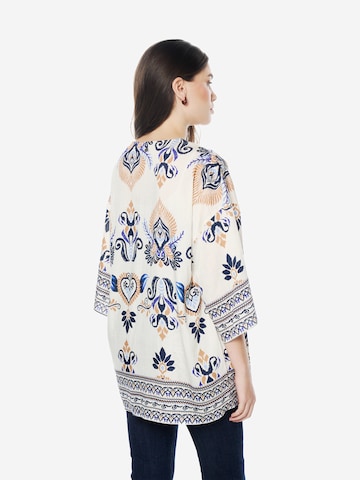 Kimono di KOROSHI in bianco