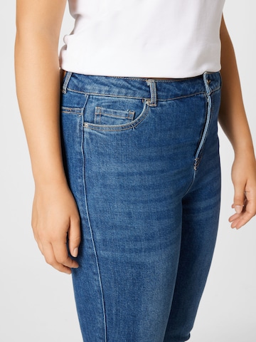 Vero Moda Curve - Bootcut Calças de ganga 'SAGA' em azul