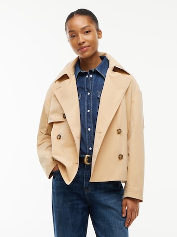 Tommy Jeans Välikausitakki värissä beige: etupuoli