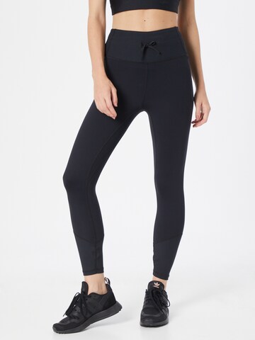 Skinny Pantalon de sport 'Meridian' UNDER ARMOUR en noir : devant