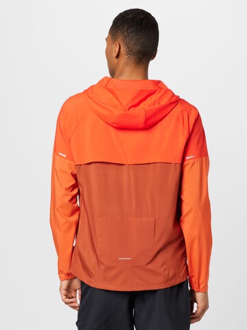 NIKE Sportjacke in Rot