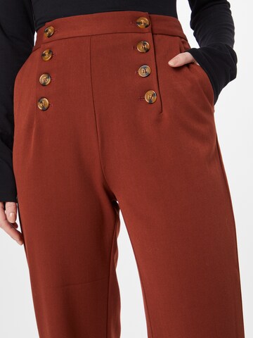 King Louie Bootcut Spodnie 'Lara' w kolorze brązowy