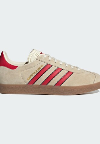Baskets basses 'Gazelle Manchester United Terrace Icons' ADIDAS ORIGINALS en blanc