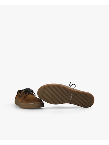 Scalpers Pantofle w kolorze brązowy