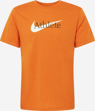 T-Shirt fonctionnel 'Athlete' NIKE en orange : devant