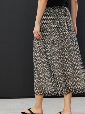 Next Rok in Zwart