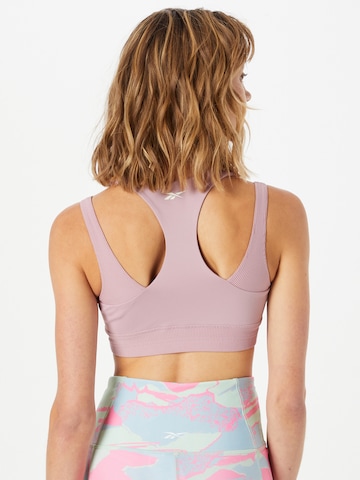 Bustino Reggiseno sportivo 'Studio Layered' di Reebok in lilla