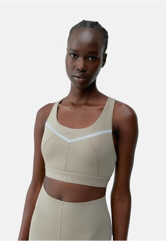 Haut de sport 'Luna' Born Living Yoga en beige : devant