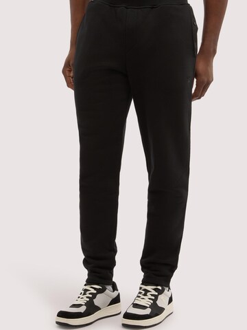 Trussardi Regular Trousers in Black: front