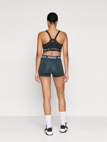 NIKE Skinny Sportshorts 'Pro' in Grün