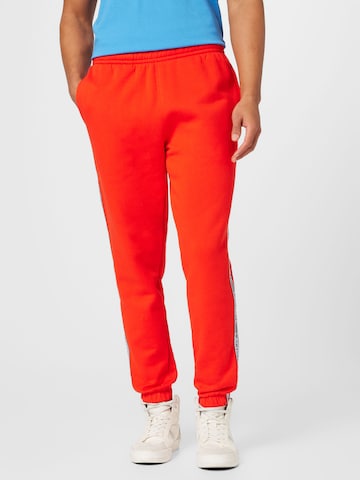 LACOSTE Tapered Pants in Red: front