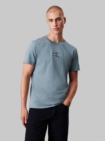 Regular T-Shirt Calvin Klein Jeans en bleu : devant