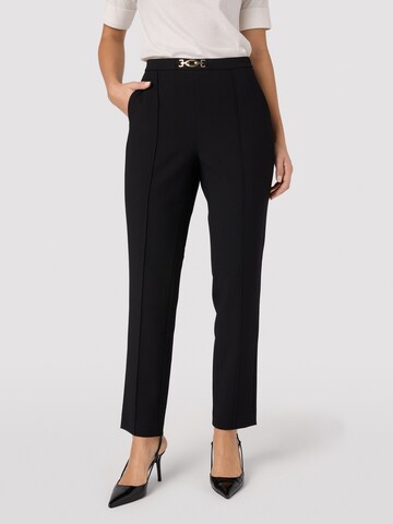 Slimfit Pantaloni con piega frontale di Quiosque in nero: frontale