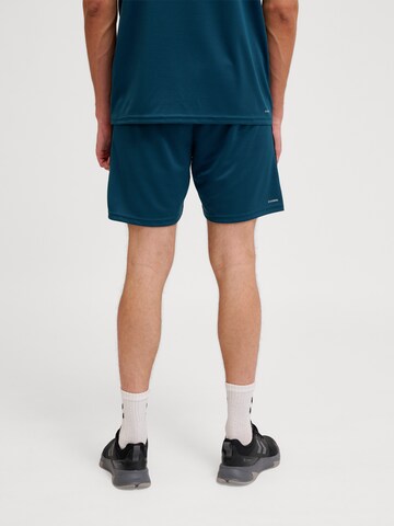 Hummel Regular Sports trousers in Green