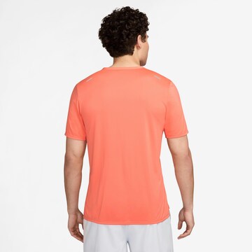 NIKE Performance Shirt 'Rise 365' in Orange
