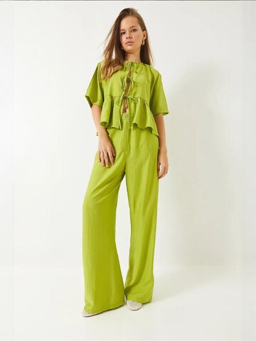 Bianco Lucci - Calças de fato em verde: frente