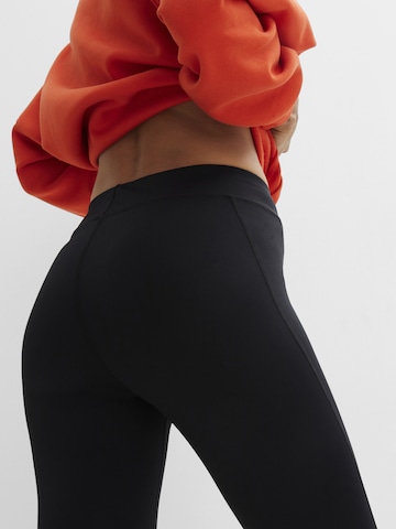 bonprix Skinny Sportbroek in Zwart