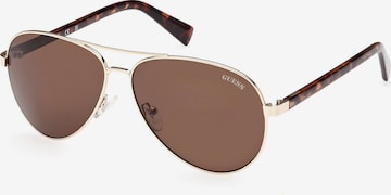 Lunettes de soleil GUESS en or : devant