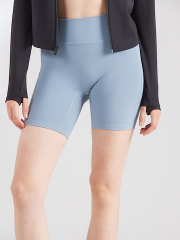 UNDER ARMOUR - Skinny Pantalón deportivo 'Motion' en azul