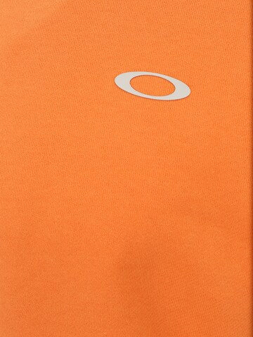 OAKLEY Sportsweatshirt in Orange